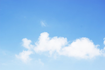 Fototapeta premium Blue sky background and white clouds soft focus, and empty space