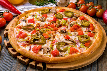 Mexican pizza with meat and jalapeno