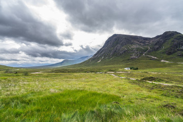 Beautiful Glencoe landscape with the famous Buachaille Etive Mor and the picturesque Lagangarbh cottage, Highlands, Scotland, Britain