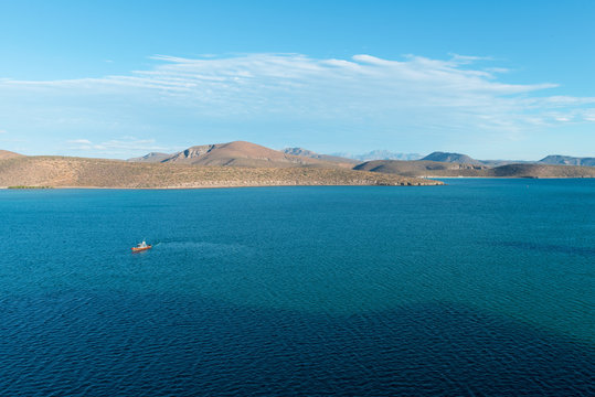 Boats against hills