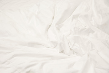 Close up of white bedding sheets and copy space