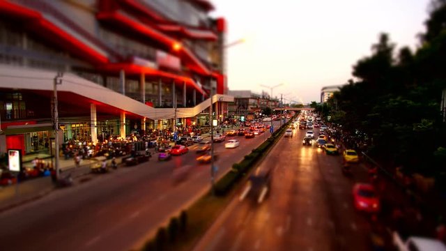 Abstract blurred time lapse congestion traffic at Chatuchak market in Bangkok,Thailand - Miniature zoom effect