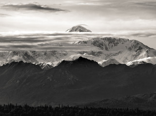 The tallest mountain in North America, Denali, in a rare view between the clouds