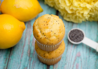 Lemon Poppyseed Muffins on a Blue Wooden Table