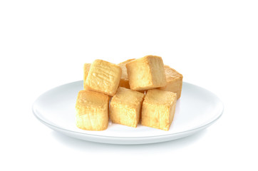 Tofu fish in white plate on white background