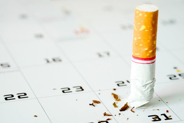 Cigarette on the calendar Concept of quitting smoking