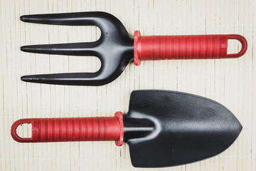 Garden tools on a wooden table.