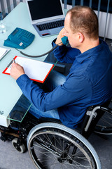 Obraz premium disabled business in wheelchair