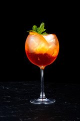 alcoholic beverage on a black background