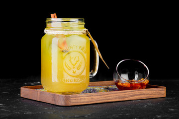 alcoholic beverage on a black background