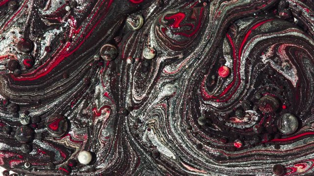 Top view Bright Collors Bubbles Slow Motion Oil Ink is fantastic structure of colorful chaotic motion bubbles stock video is a beautiful, unique, organic.