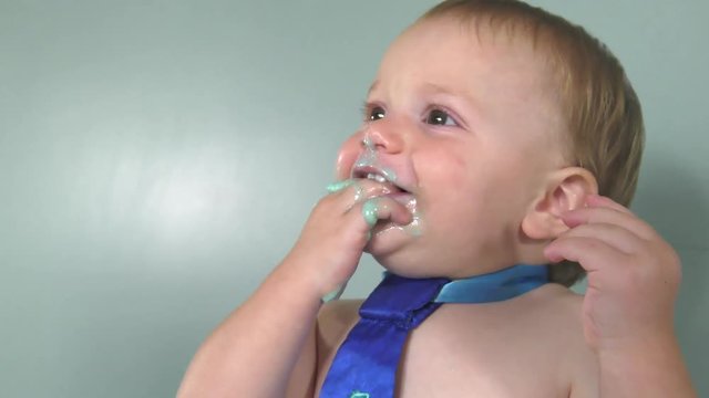 first birthday boy cake smash cute baby smiles messy face 4k