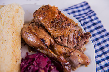roast crispy duck wit red cabbage and dumplings eastern central european traditional rustic recipe 