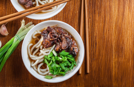 Japanese Udon noodles with beef, green onion and soup
