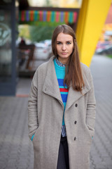 Girl in a coat at a cafe in Siberia