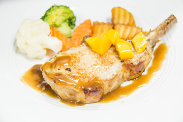 Lamb steak with sauce and potato