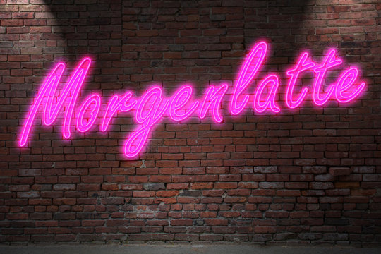 Leuchtreklame Morgenlatte an Ziegelsteinmauer