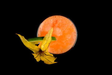 alcoholic cocktail on a black background with insulation