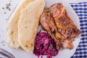 roast crispy duck wit red cabbage and dumplings eastern central european traditional rustic recipe 