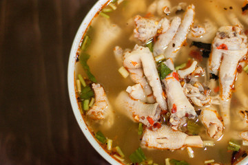 Thai food spicy chilli chicken feet soup Thailand call 