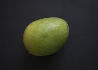  Mango on black background