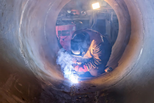 Welding works inside the case of the device in conditions of strong smoke