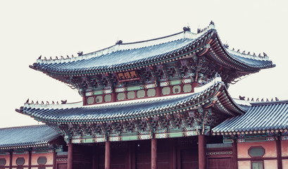 Gate to Gyeongbokgung Palace - writing in Chinese above entrance says  - "Geumjeong gate" -  not translatable name of a gate"Geumjeong gate" - Seoul, South Korea
