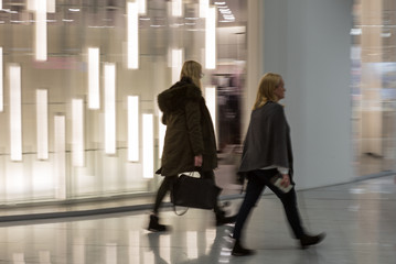 Business woman rushing at the airport in the morning  with motion blur effect - 15