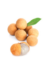 Branch of fresh ripe longan with green leaf