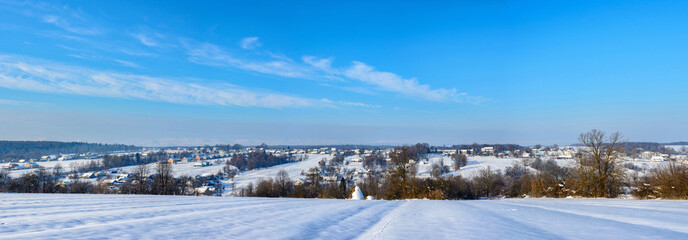 Fototapeta na wymiar Amazing panorama of the Ukrainian village in western Ukraine in winter