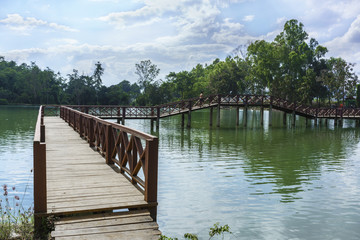 Wooden bridge across the lake in Thararak waterfall baan chedi kho, Mae sot, Tak, Thailand