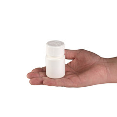 plastikowa butelka po lekach w dłoni