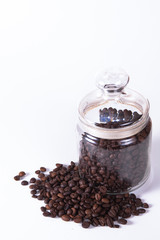 Coffee cup and beans on old kitchen table. Top view with copyspa