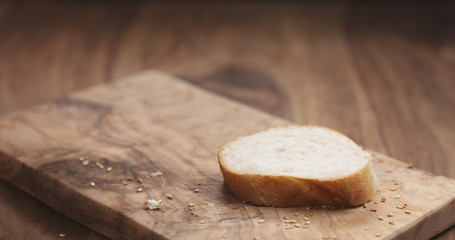 baguette slice on wood board