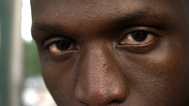 strong and angry african man's eyes- macro