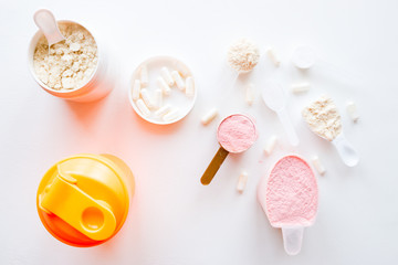 sports supplements on white background