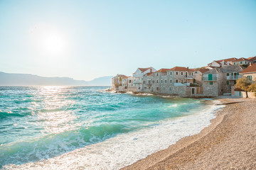 Panoramic view on a beach of a small town Postira - Croatia, island Brac