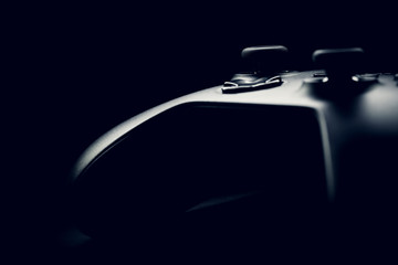 Neat studio shot of gamepad on black background