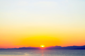 Lovely sunset in a harbor of small town Postira - Croatia