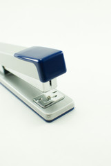 Gray-blue stapler on a white background; isolated 
