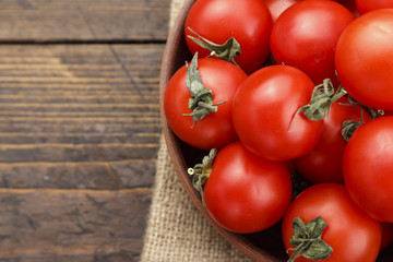  Fresh tomatoes. It can be used as background. (selective focus).Delicious red tomatoes. A pile of tomatoes.