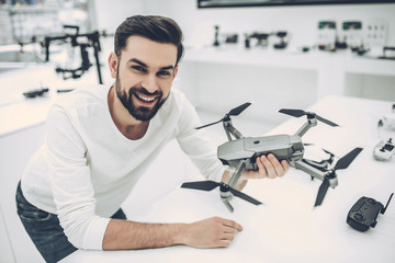 Man in quadcopter store