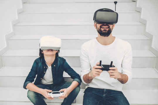 Dad and son in quadcopter store