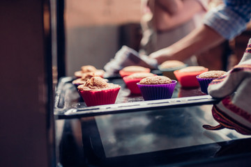 Grandmother and granddaughter cooking on kitchen