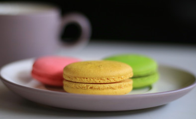 Colorful macaron and a cup of drink