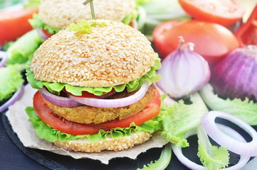 Veggie burger with chickpeas patty, vegan fast food, selective focus