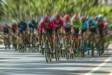 Competition cycling race on the road. Motion blur photo