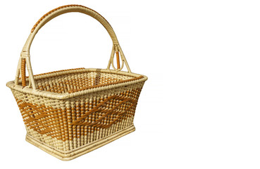 Traditional wicker basket with handles isolated on white background