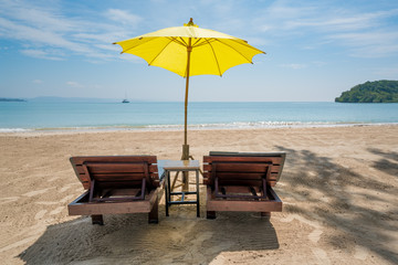 Beach Chairs and Umbrella on summer island in Phuket, Thailand. Summer, Travel, Vacation and Holiday concept.