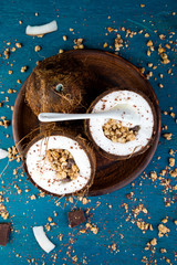 Healthy breakfast in coconut bowl.